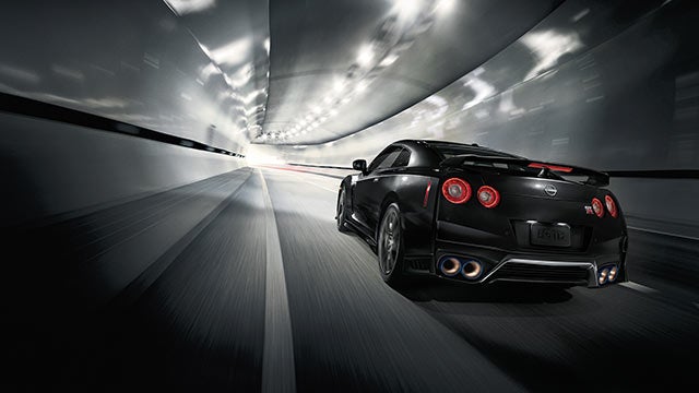 2023 Nissan GT-R seen from behind driving through a tunnel | Peruzzi Nissan in Fairless Hills PA